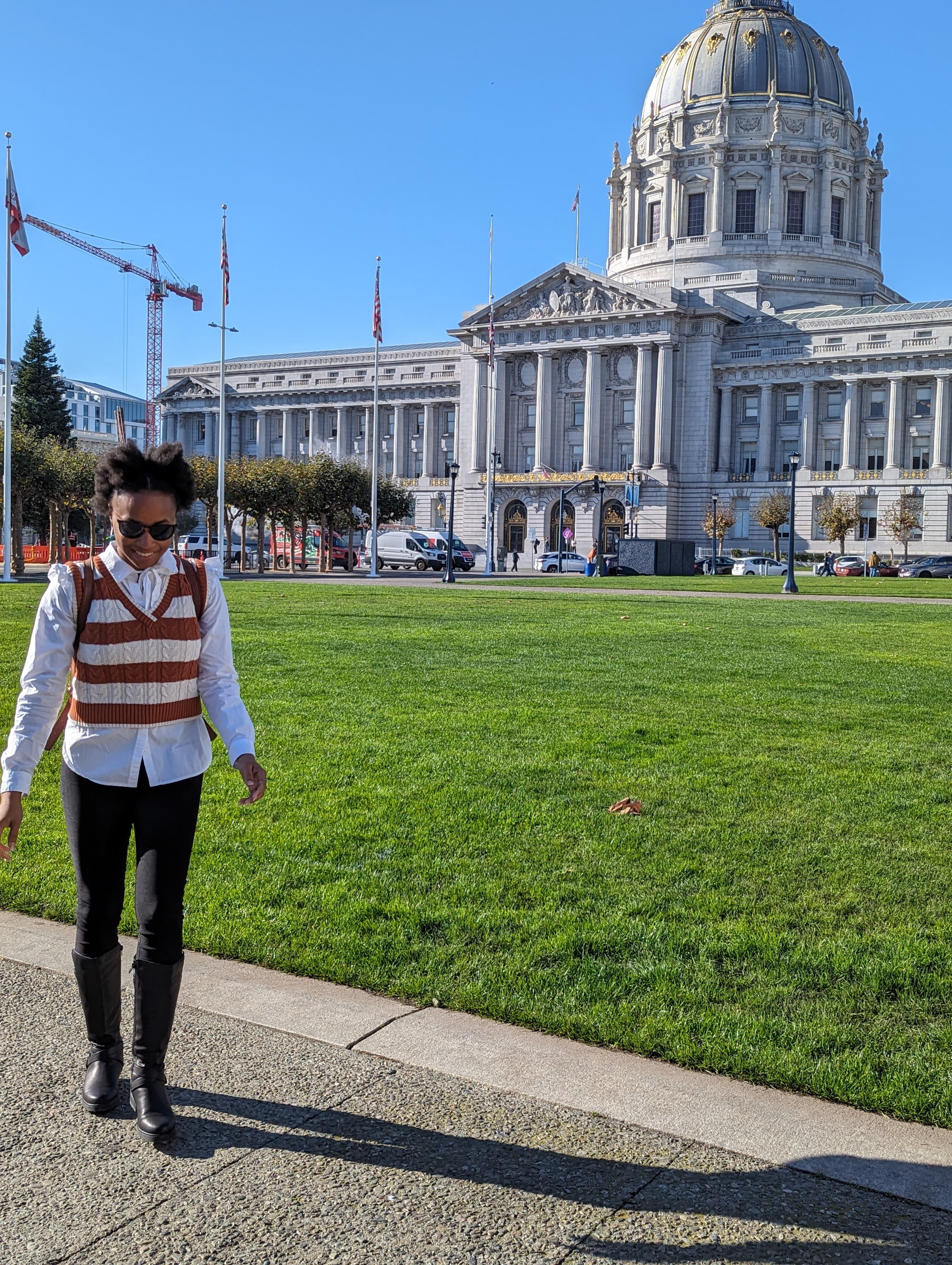 Brit is standing in front of city hall in San Francisco